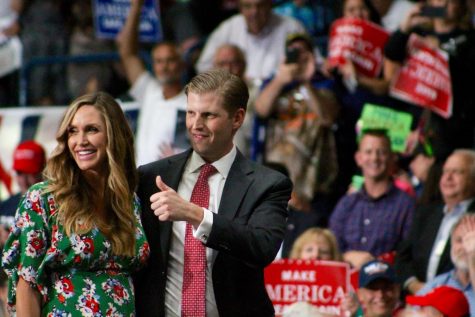 Eric and Lara Trump finish their speech and give the audience a thumbs up at the Covelli Centre in Youngstown, Ohio on Tuesday, July 25, 2017.