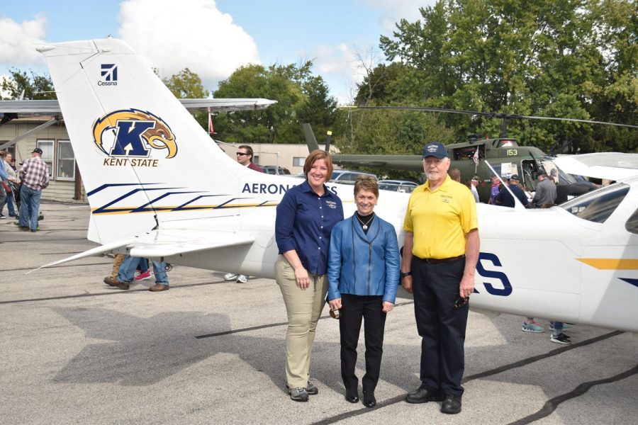 Dr. Maureen McFarland, Program Director of Aeronautics (Left), Beverly Warren, President (Middle), and Robert Sines Jr., Dean (Right), pose at the Kent State University Aeronautics Fair, on Saturday, Sept. 9, 2017.