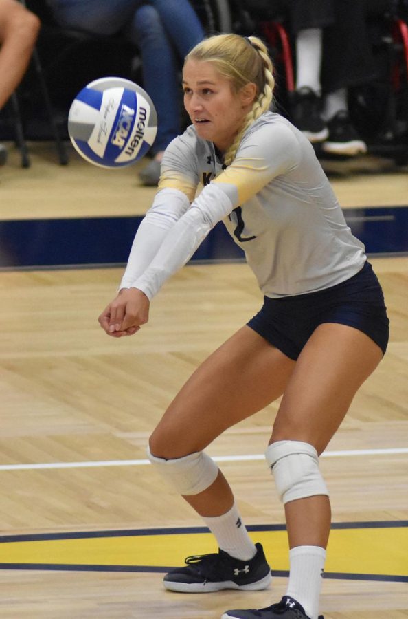 Kent State defensive specialist Sam Jones passes during a game against Charleston.