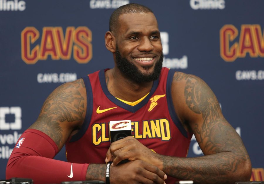 LeBron James smiles during a press conference during the Cleveland Cavaliers media day in Independence, Ohio, on Monday, Sept. 25, 2017.