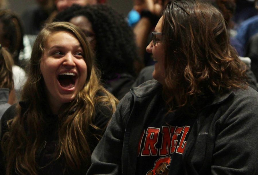 Abigayle Feasel, a freshman integrated laguage arts major (left), and Cailey Coates, a freshman exploratory major, react to the speaker during the I Love Female Orgasm presentation Oct. 23, 2017, in the KIVA.