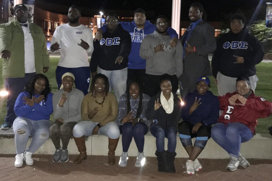 Members of Phi Beta Sigma pose for a portrait during the Sleep Out for the Homeless event Friday, Oct. 20, 2017.