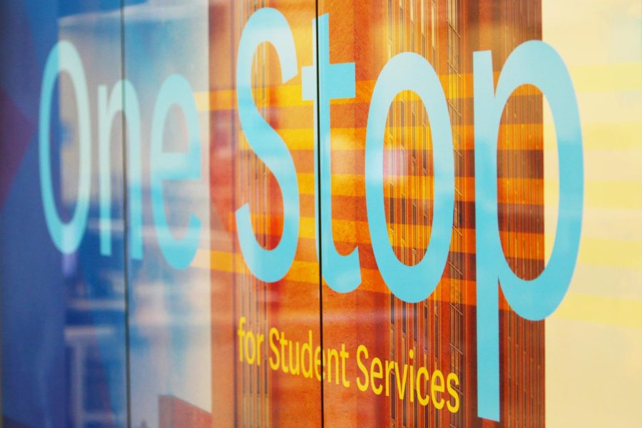 The sign outside the One Stop office on the first floor of the Library.