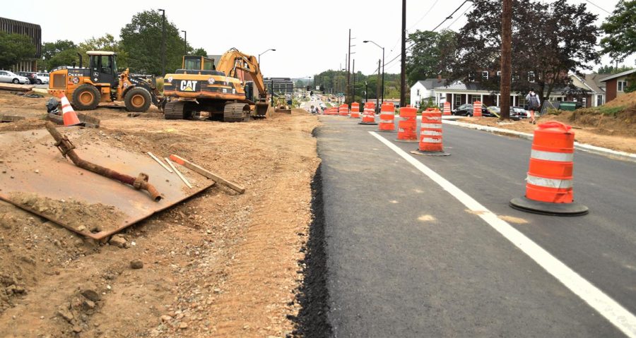 Construction takes place on Summit Street Tuesday, Aug. 29, 2017. 