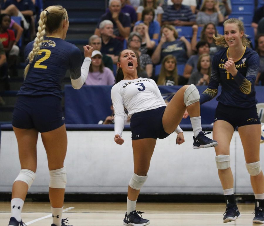 Kent State senior Challen Geraghty cheers with teammates after scoring against Akron Friday, Sept. 22, 2017. The Flashes fell to Akron, 3-1.