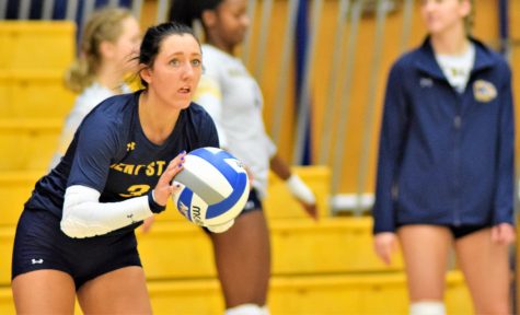 Kent State defensive specialist Challen Geraghty prepares to serve during a match against Miami (OH) Saturday, Sept. 30, 2017.