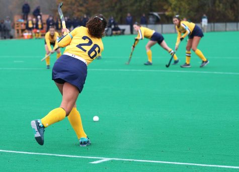 Freshman Clara Rodriguez Setó hits the ball into play during the field hockey game on Oct. 28, 2017 at Dix Stadium.