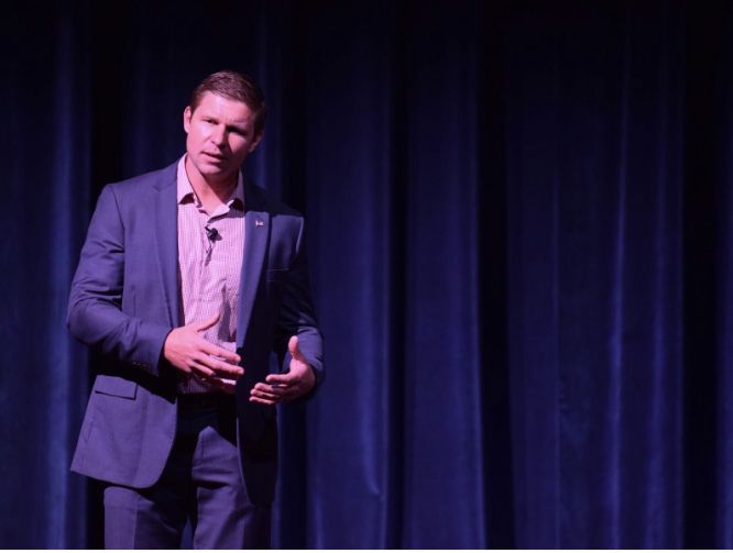 Kevin Lacz explains physical risk-taking at his book signing event at the Student Center Ballroom Wednesday, Nov. 8, 2017. I wanted to be better at the position than when I showed up, Lacz said, referring to his prior work ethic. 