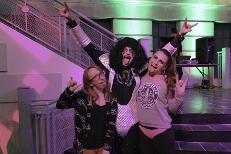 Students pose for a picture at the 80s-themed party held at Rockwell Hall Friday, Nov.3, 2017.