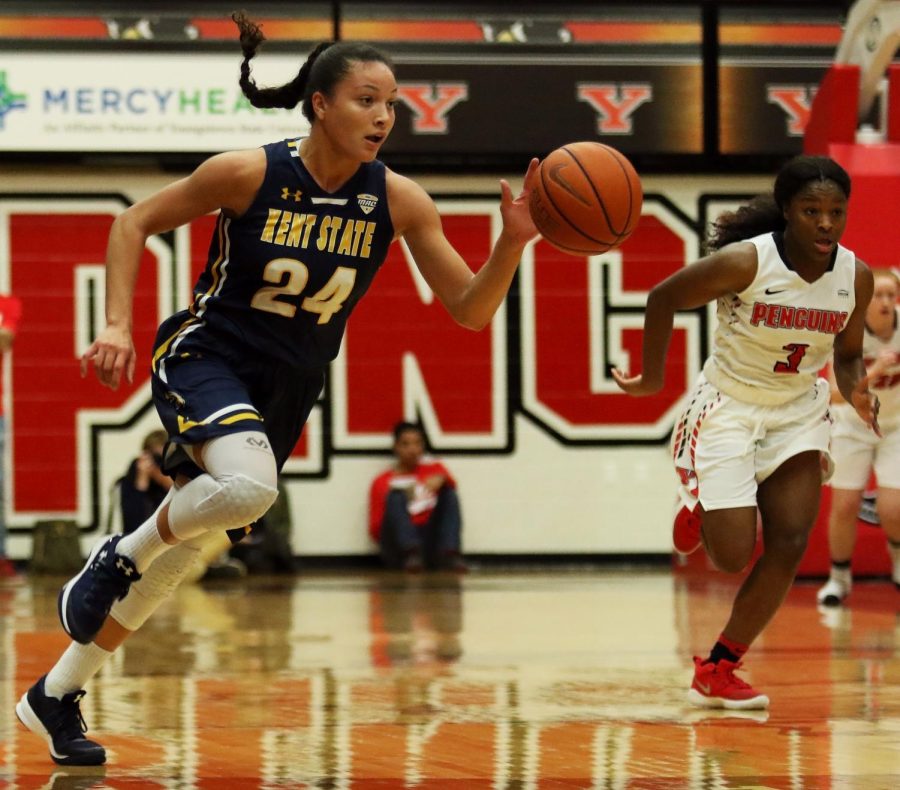 Kent State junior guard Alexa Golden dribbles past Youngstown State freshman forward Amara Chikwe at Beeghly Center in Youngstown, Ohio, Tuesday, Nov. 14, 2017. [FILE]