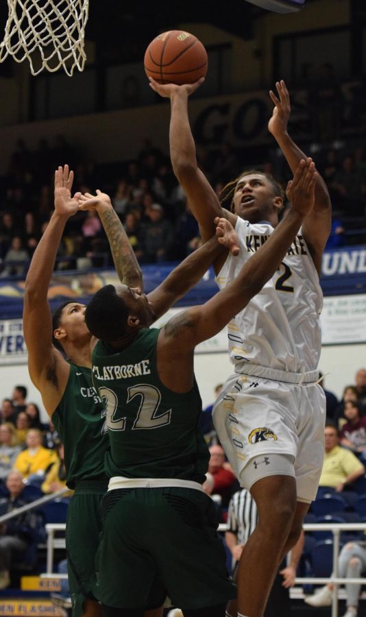 Cleveland State sophomore point guard Evan Clayborne tries to block Kent State freshman forward BJ Duling from scoring in the first half of the game Saturday, Dec. 2, 2017. 
