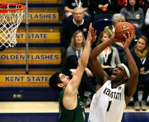 Kent State center Adonis De La Rosa attempts a shot during the second half of the game against Cleveland State in the M.A.C Center Saturday, Dec. 2, 2017. 
