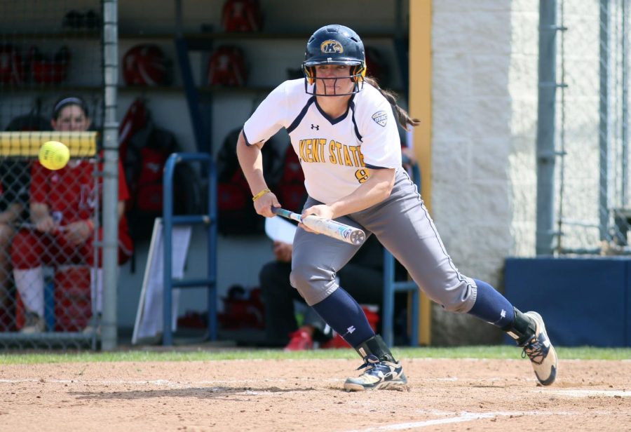 Then a Kent State senior infielder, Maddy Grimm bunts during the double-header against Miami University at the Diamond at Dix on Friday, April 14, 2017. The Flashes lost, 12-4. [FILE]