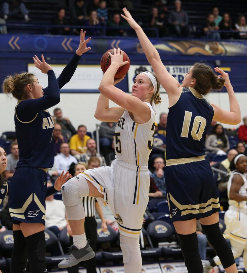 Senior forward Jordan Korinek drives to the basket for two of her game-high 16 points during Kent State's 60-55 win over Akron Saturday at the M.A.C. Center. 