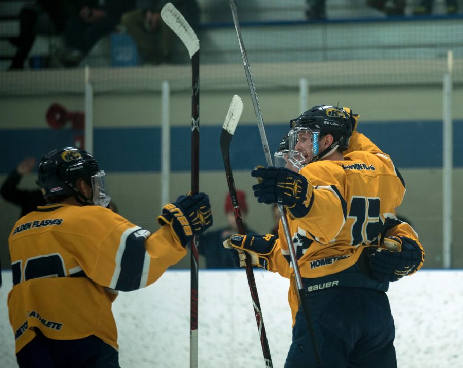 Kent State hockey players celebrate one of the Flashes' goals in a 6-2 win over Mercyhurst Saturday, Feb. 10, 2018. 