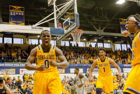 Kent States Jalen Avery, Jaylin Walker and Adonis De La Rosa celebrate after Avery made a basket after drawing a foul during the Flashes 78-68 win over Akron on Feb. 17, 2018. Avery scored 16 points in the final 4:47 to seal the victory.