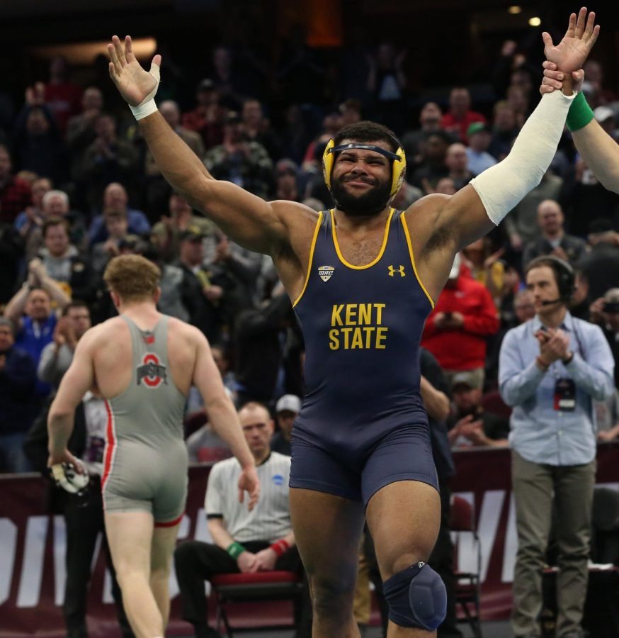 Kent State wrestler Kyle Conel celebrates after defeating No. 1 seed Kollin Moore of Ohio State for the second time in as many days to secure third place at the NCAA Wrestling Championships at Quicken Loans Arena in Cleveland on March 17, 2018. 