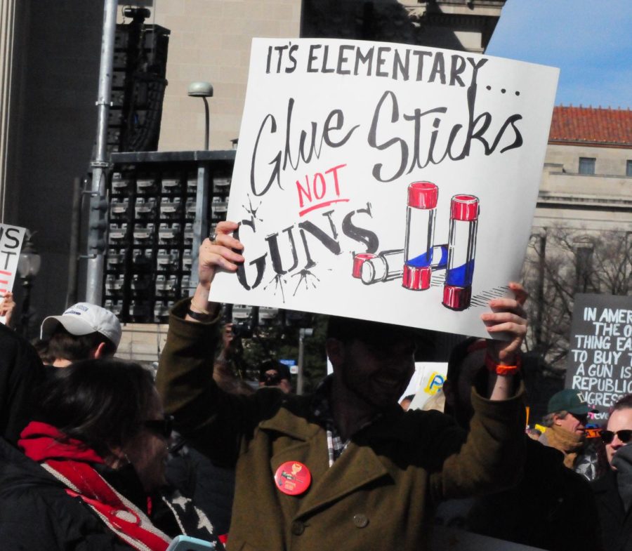 A protester holds up their sign during the Washington D.C. march on March 24.