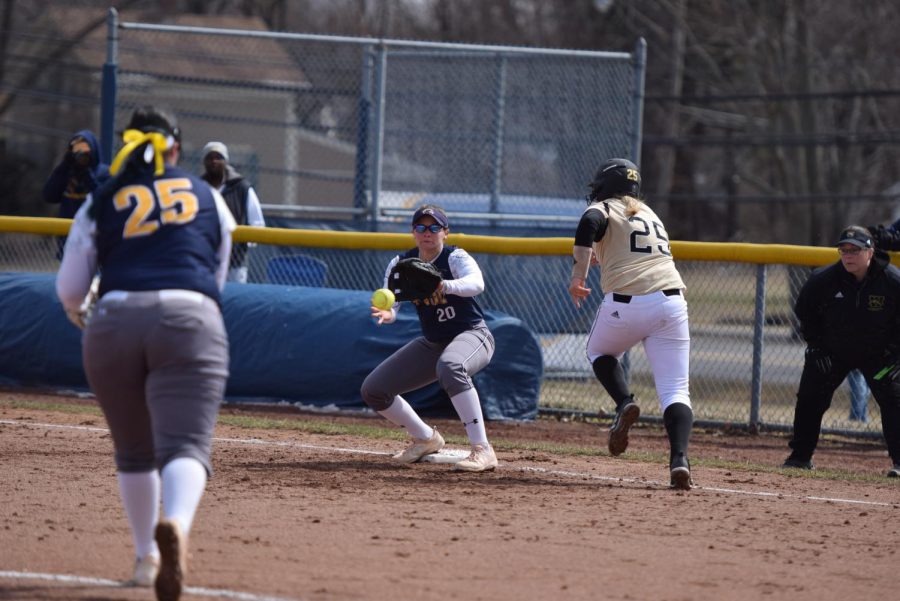 Kent State’s Madi Huck throws the ball to Hunter Brancifort at first base for the out during the Flashes 1-0 victory over Western Michigan on March 24, 2018.