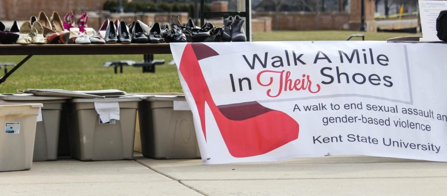 An array of heels line the table as they remained untouched during the Walk a Mile in Their Shoes Tuesday evening.
