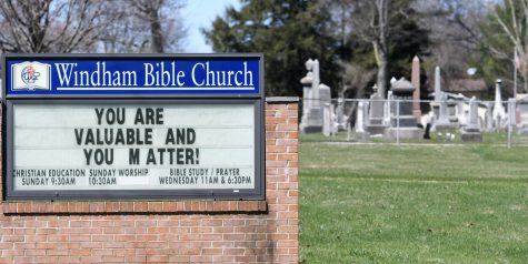 (3:19 pm) A sign outside the Windham Bible Church delivers a powerful message, while standing in front of a cemetary, Friday afternoon, April 20, 2018. Nick Cammett/The Kent Stater