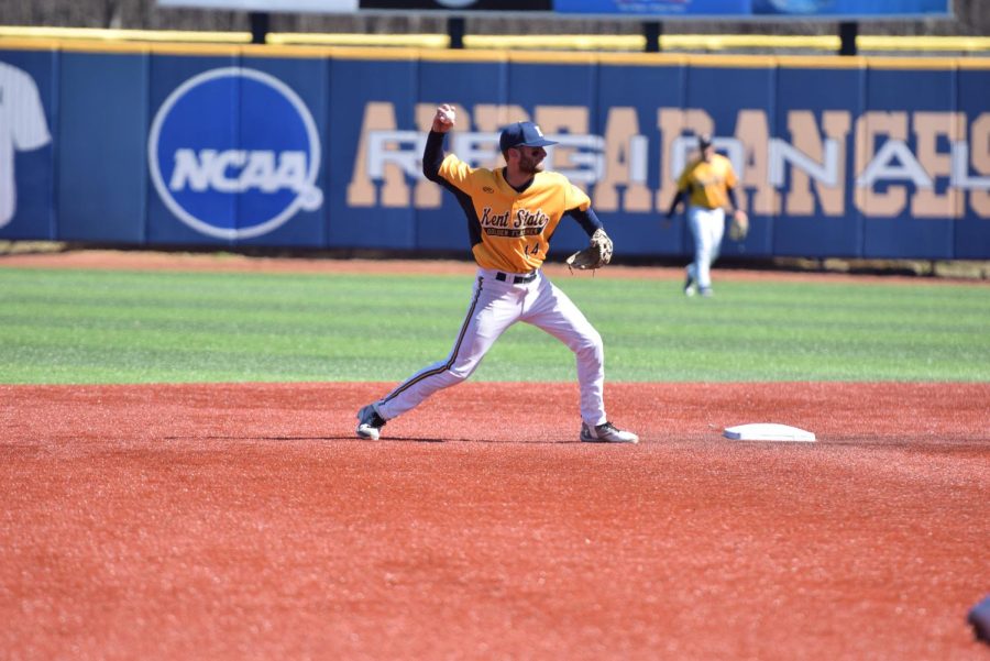 Kent State junior Josh Hollander throws from second to first for the out on March 25, 2018. The Flashes lost to Ball State, 7-2.
