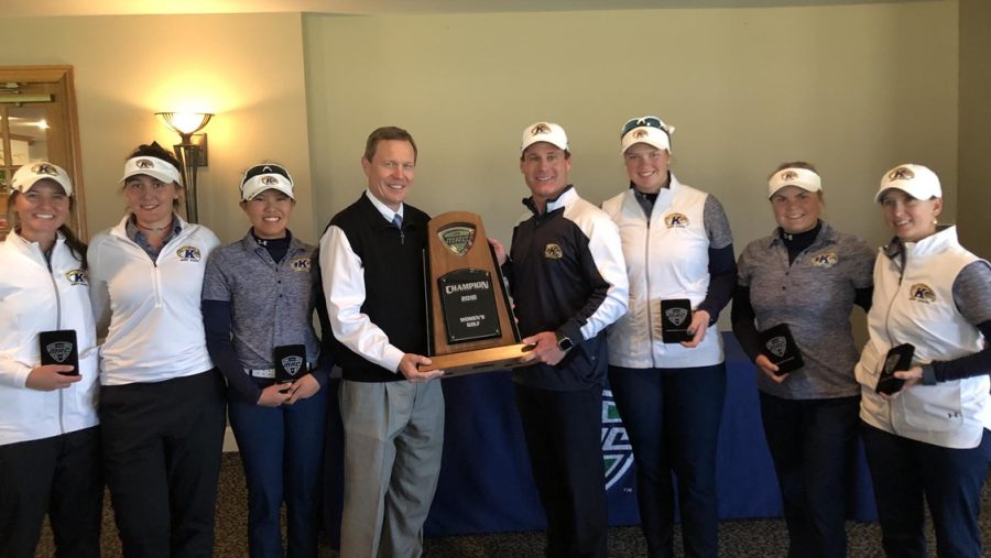 The+Kent+State+womens+golf+team+poses+with+the+Mid-American+Conference+Championships+trophy+after+winning+their+20th+straight+league+title.+The+Flashes+beat+the+field+by+57+strokes.%C2%A0