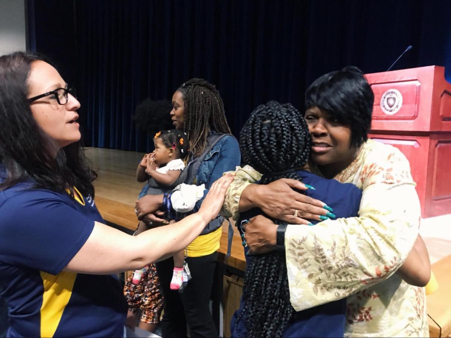 Vashti Mccullough eagerly waits in line to hug Deborah Turner after her powerful speech at the Kiva Sunday, June 10, 2018. Academic advisor Heavann Steplight sheds tears while being comforted by faculty Patty Robinson.