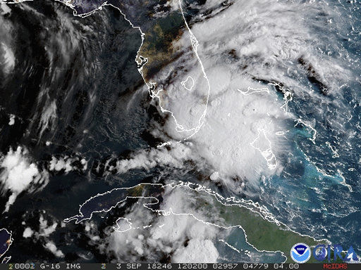 In this image released by NOAAs GOES-16 on Monday, Sept. 3, 2018, Tropical Storm Gordon appears south of Florida. The storm is expected to cross from southwest Florida into the Gulf Coast later Monday afternoon. (NOAA via AP)