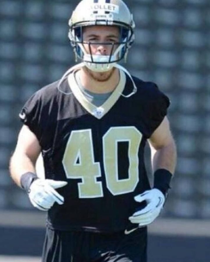Luke Wollet as a member of the New Orleans Saints