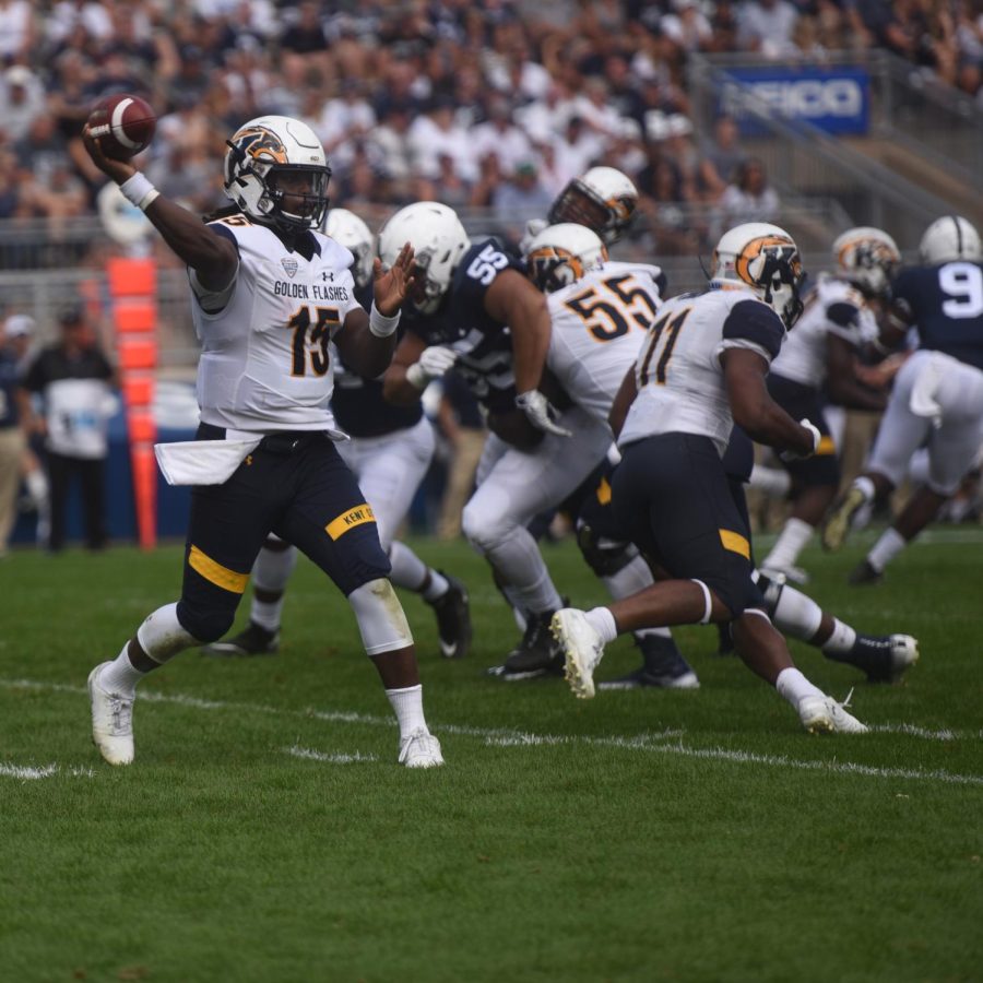 Kent State’s Woody Barrett attempts a pass during the second half during the Flashes matchup against Penn State on Saturday Sept. 15, 2018. Kent State lost 63-10.