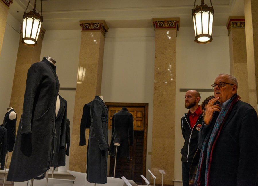 Parker Bosley views pieces in the Kent State University Museum’s latest exhibit, called “Beyond the Suit, on Sunday, Sept. 9, 2018. It features contemporary menswear from the collection of Alexandre Marr and Dominic Iudiciani.
