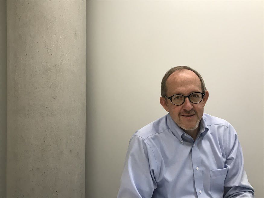Mark Mistur, the dean of the College of Architecture and Environmental Design, poses for a photo in a meeting room in the architecture building on Monday, Oct. 8, 2018.