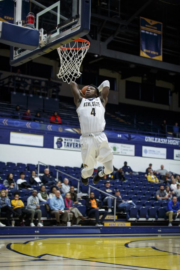 Kent State junior guard Antonio Williams dunks during the Flashes’ exhibition game between Robert Morris on Sunday.