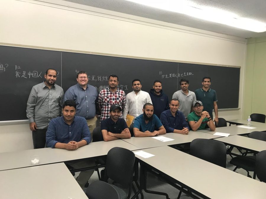 A group of BLCSI scholars with TESL professor Ryan Miller, second from the left in the back row.