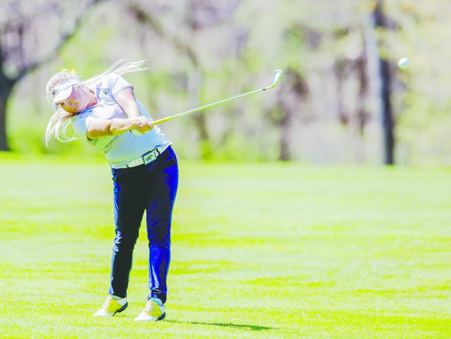 Then-junior Michaela Finn hits from the 12th hole during the Mid-American Conference Womens Golf Championship at Silver Lake Country Club on Sunday, April 23, 2017. Finn placed first and won the individual MAC title. Kent State won its 19th consecutive title. 