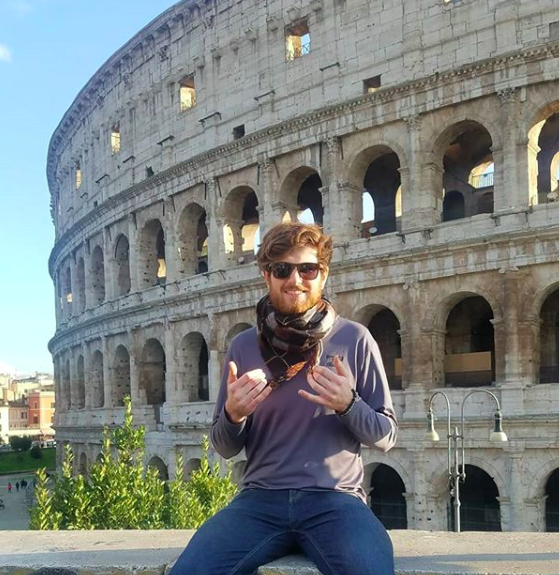 Morgan Frantz sits outside the Colosseum in Rome. Courtesy of Morgan Frantz