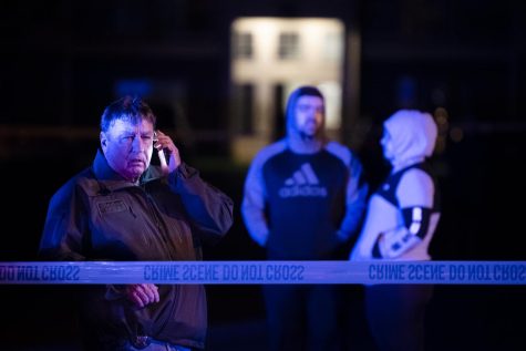 Portage County Chief Deputy Dale Kelly speaks on the phone as police investigate a shooting outside the Pebblebrook Apartments in Franklin Township on Sunday, Nov. 4, 2018. One male victim was shot in the shoulder and transported to the hospital. 