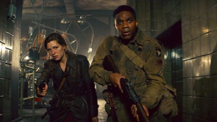Mathilde Ollivier and Jovan Adepo in the World War II action-horror film Overlord.