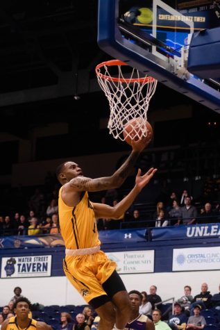 C.J. Williamson, junior guard, goes in for a layup for the Flashes at Kent State University on November 18, 2018.