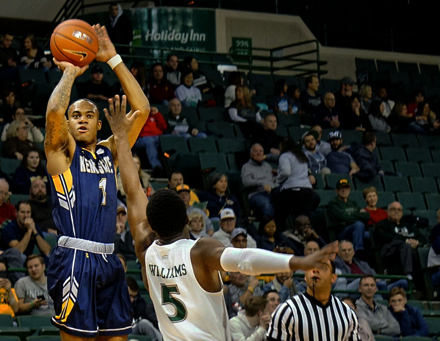 Junior guard C.J. Williamson shoots a contested jumper during Kent States game against Cleveland State on Nov. 10, 2018. Williamson scored 16 points and grabbed 8 rebounds in his debut, an 83-79 win over the Vikings at the Wolstein Center. 