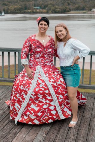 Joanna Wilson models the dress that Kent State student Alyssa Hertz created out of Netflix envelopes. 