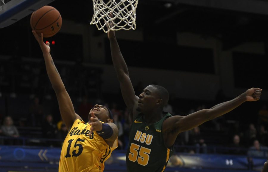 Kent State guard Anthony Roberts attempts a shot during the Flashes' matchup against Norfolk State on Dec. 1, 2018. Kent State won, 78-67.