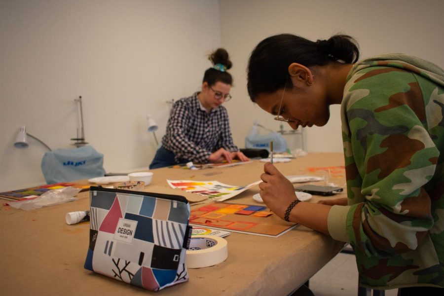 Khushi Kothari, a freshman fashion marketing major, and Remi Meeker, a freshman fashion design major, work on homework in Rockwell Hall. 