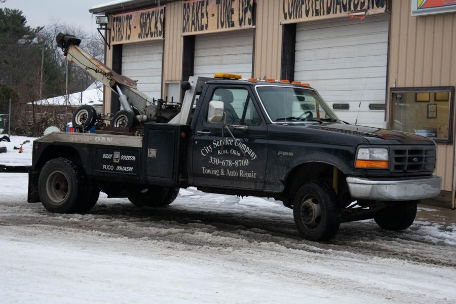 A tow truck for City Service Company sits outside the garage in Kent on Wednesday.