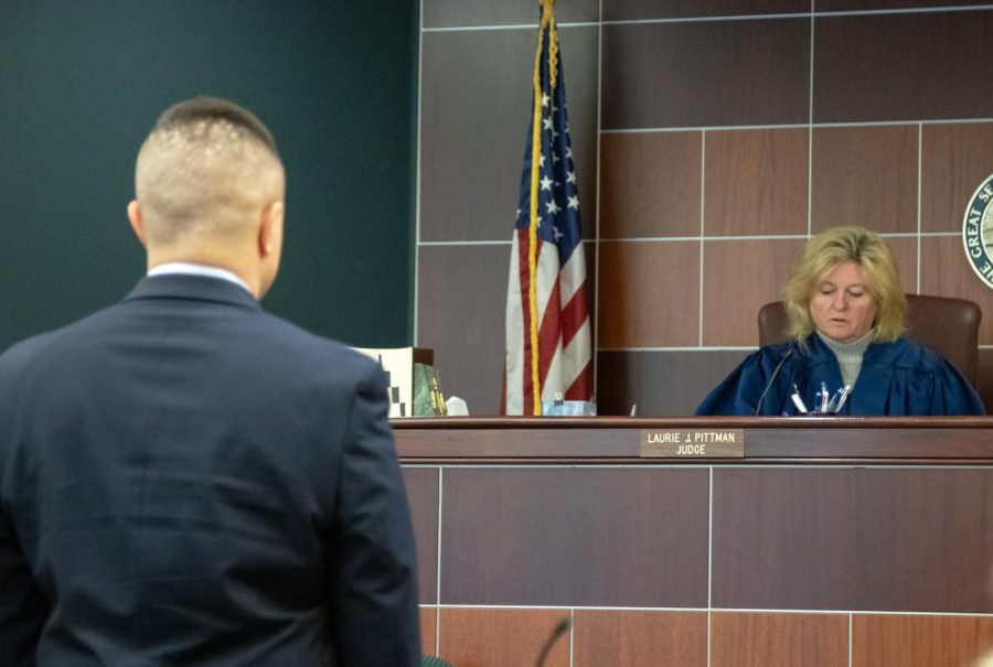 Connor Hendry stands before Judge Laurie J. Pittman on Tuesday, Feb. 19, 2019.