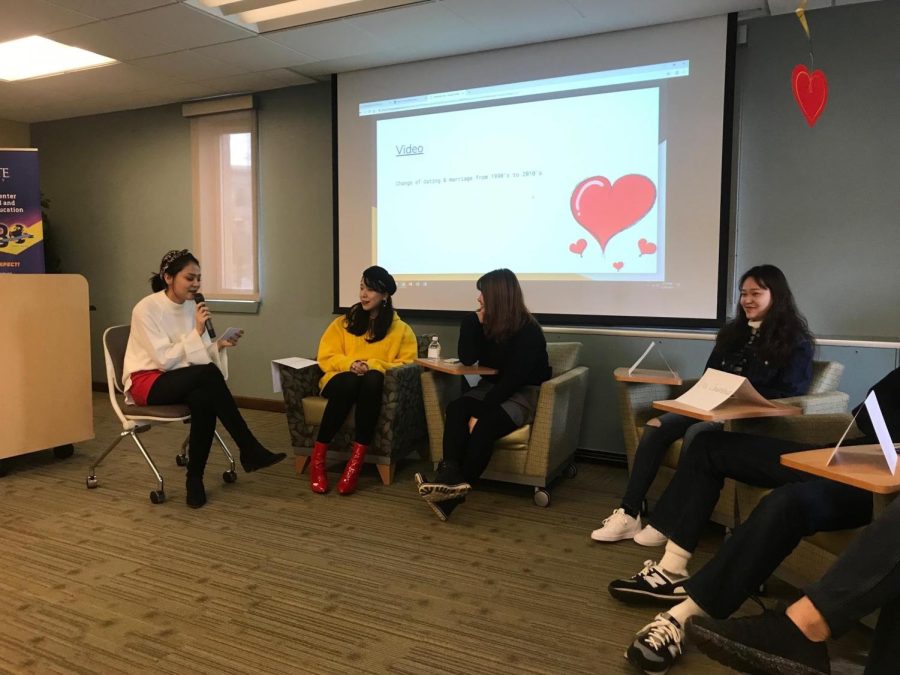 Graduate assistant and Chinese representative Aierken Subinuer (far left) at the Coming Together event in White Hall asks panelists about their dating life and cultural traditions in dating back home on Thursday.