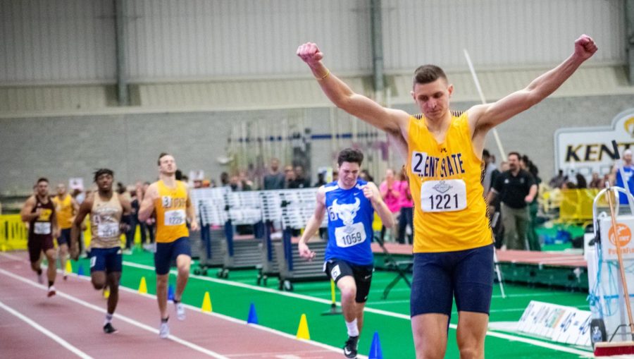 Junior TJ Lawson celebrates after finishing first in the 1000 Meters Heptathlon event with a time of 2:49.25 during the MAC Indoor Championship.
