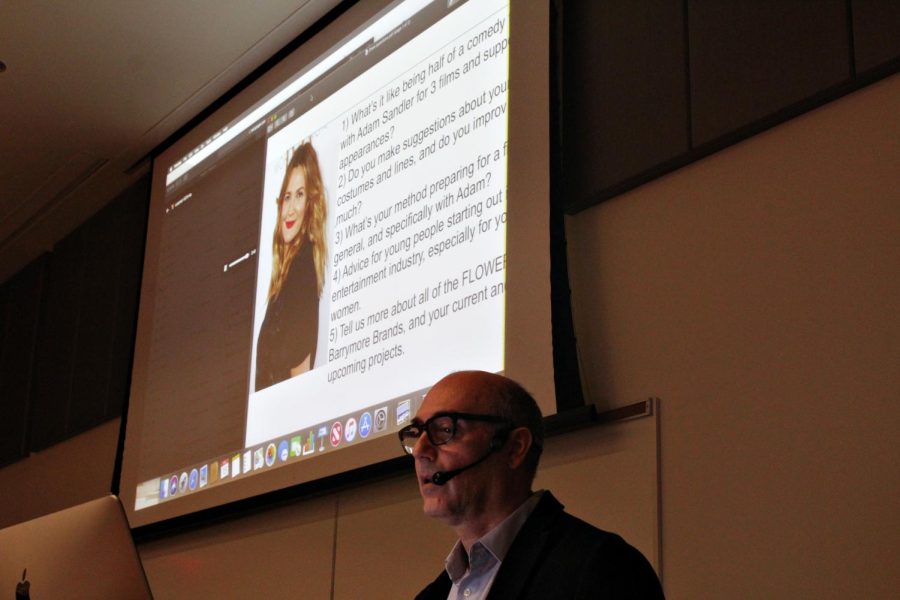 Professor+Ron+Russo+listens+to+an+audio+recording+of+Drew+Barrymore+herself.+Russo+and+the+class+listened+to+Barrymores+advice+for+students+in+the+classroom.
