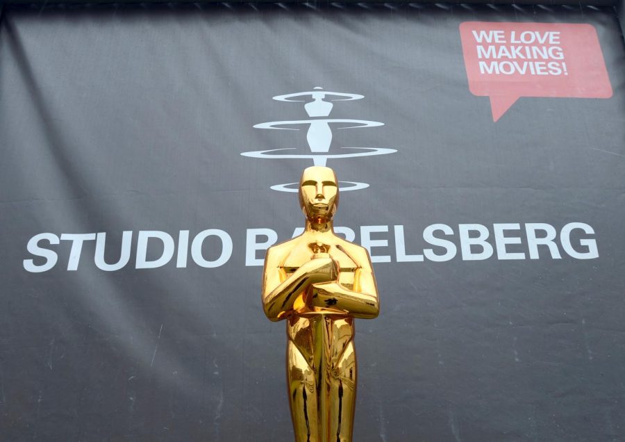 The replica of an Oscar, photographed during a press event of the film studios Babelsberg in Potsdam (Brandenburg) on ​​23.02.2015 in front of the logo of the studio. The Grand Budapest Hotel was awarded Four Academy Awards on Monday night in Hollywood for Best Production Design, Best Costume Design, Best Make-Up and Best Hairstyles, and Best Film Music.